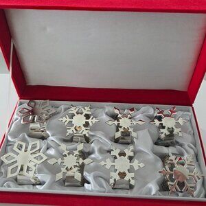 8 Silver Snowflake Napkin Rings